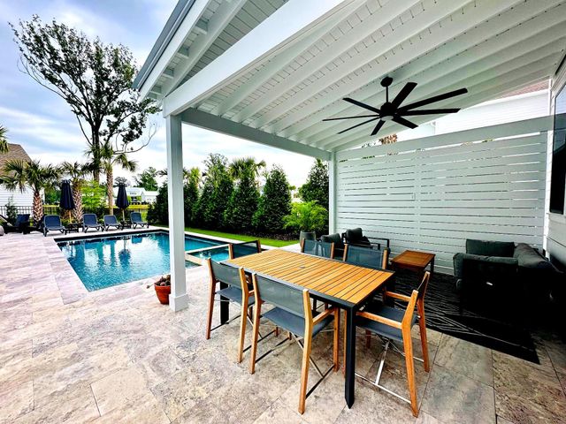 Custom built pergola in a Charleston backyard