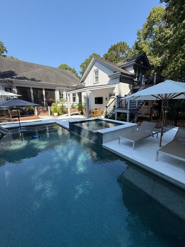Pool courtyard with custom outdoor living area