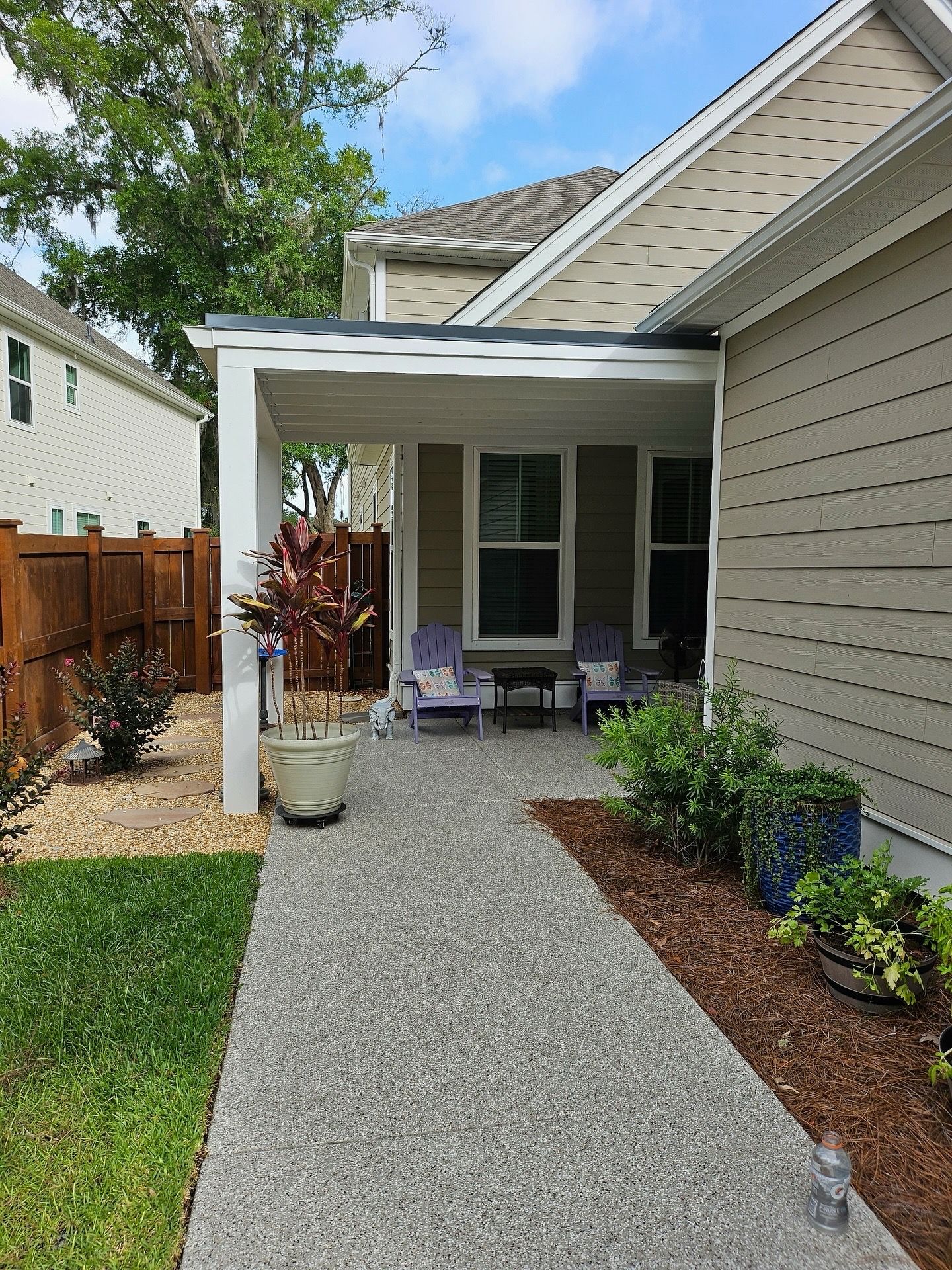 Side-yard covered patio with seating