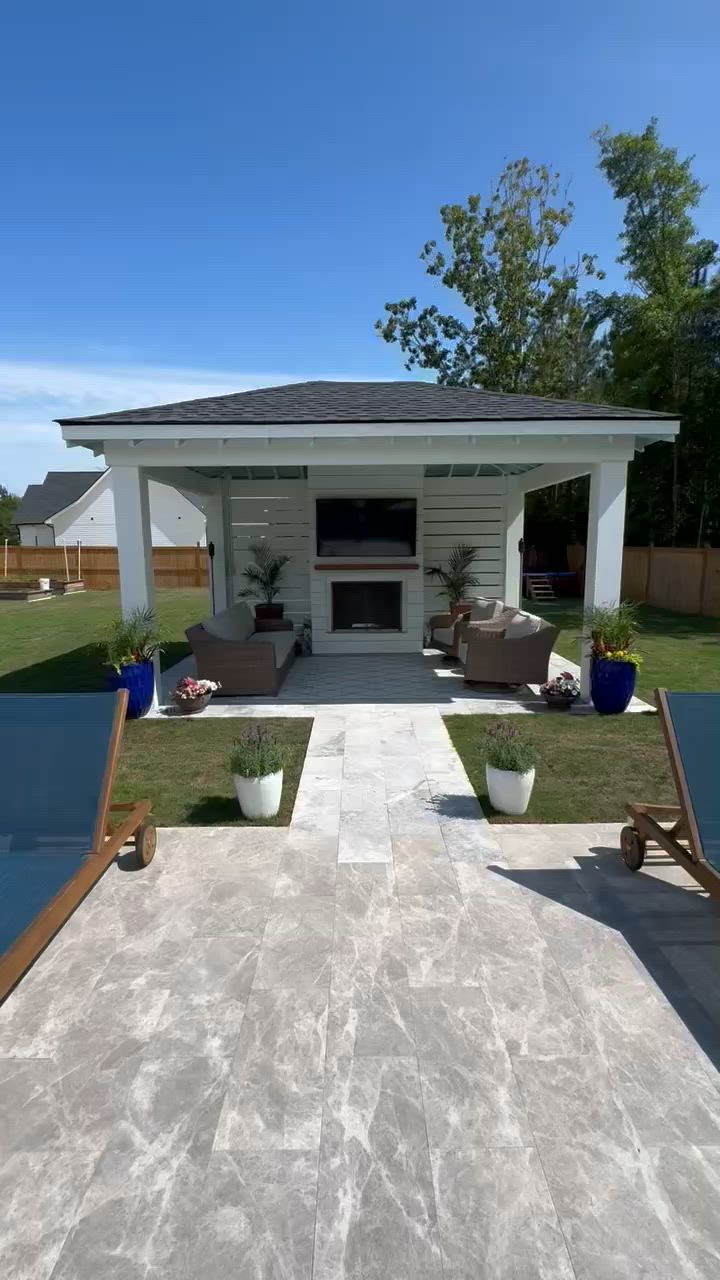 Hip-roof pavilion with fireplace and TV